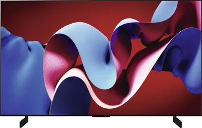 A modern television displaying abstract colorful artwork.
