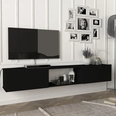 A modern living room setup with a wall-mounted TV and entertainment unit.