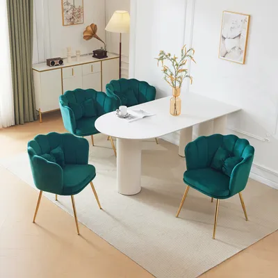 A dining room setting with a table and chairs.