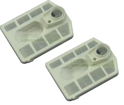 Two white air filters for a chainsaw are shown on a white background.
