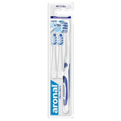A package containing a toothbrush and two replacement heads.
