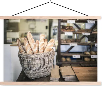 Produktbild von MuchoWow® Textilposter Die Baguettes vom Bäcker 120x80 cm mit holzfarbenen Rahmen - Aufhängeset