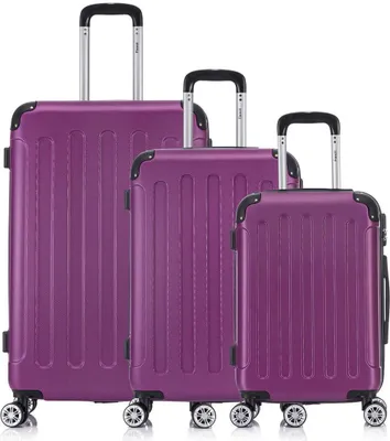 Three purple suitcases of varying sizes arranged side-by-side on a white background.
