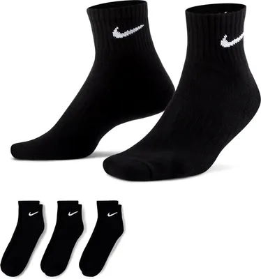 A pair of black Nike ankle socks are shown from the front, with three more pairs of black Nike ankle socks arranged below them.