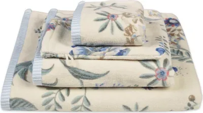 A stack of folded towels with a floral pattern.