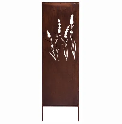 A decorative metal garden screen with a laser-cut design of grass stalks.