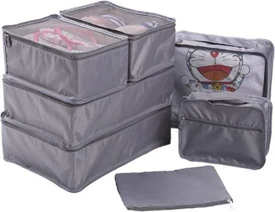 Produktbild von Unyqoos® 7‑teiliges Reise‑Organizer‑Set – Packwürfel & Taschen aus wasserfestem, waschbarem Polyester: 3 Kleiderbeutel, 1 Unterwäschebeutel, 1 Schuhbeutel, 1 Kosmetiktasche, grau