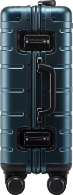 A close-up view of the back of a teal suitcase.