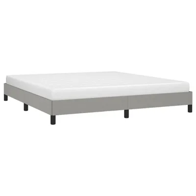 A bed frame with a mattress on a white background.