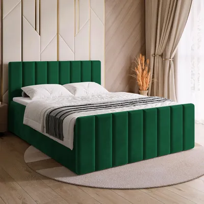 A dark green upholstered bed with white bedding is shown in a bedroom setting.