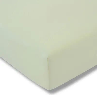 A close-up view of a light green fitted sheet, showing the corner.