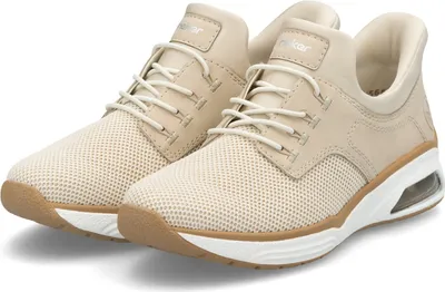 A pair of beige sneakers on a white background.