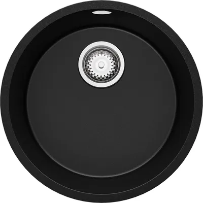 A top-down view of a black round kitchen sink with a silver drain.