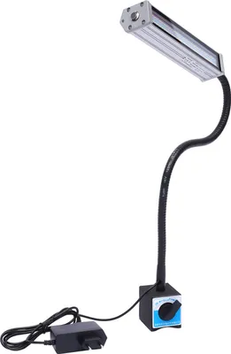 A machine lamp with a magnetic base and a flexible gooseneck.