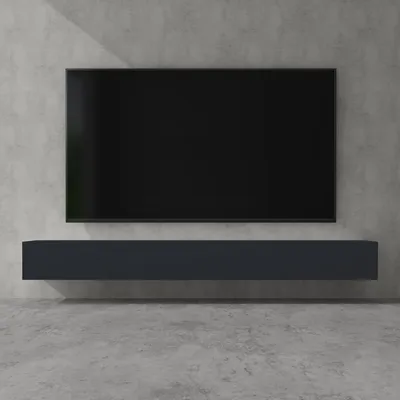 A modern TV stand mounted on a concrete wall, with a flat-screen TV above it.