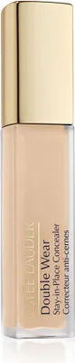 A bottle of Estee Lauder Double Wear Stay-in-Place Concealer in a light beige shade with a gold cap.