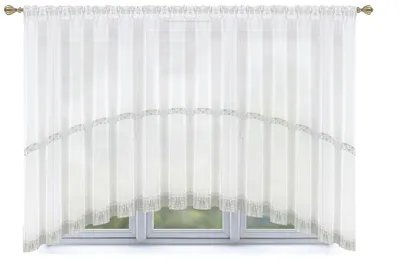 A white sheer curtain hanging over a window.