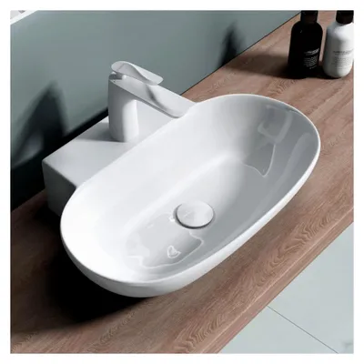 Produktbild von Waschbecken 56x38,5x12cm Aufsatzwaschbecken aus Keramik in Weiß mit Nano-Versiegelung