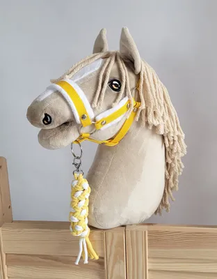 Immagine prodotto di Set per cavalli Hobby: cavezza A3 con pelliccia bianca + corda di legatura - bianca e gialla