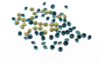 Produktbild von Vintageparts Strasssteine Glas petrol 1,7 mm, 100 Stück