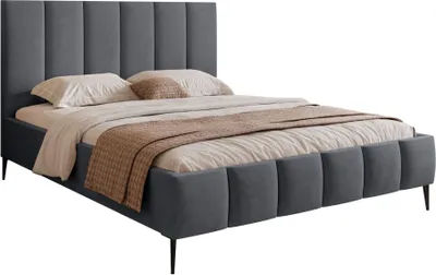 A bed with bedding is shown against a white background.