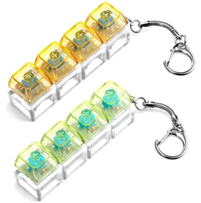 Image de 2 jouets anti-stress en forme de clavier, avec 4 boutons, pour réduire le stress