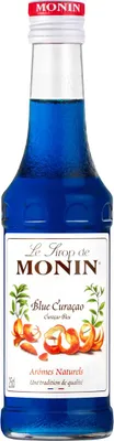 A bottle of Monin Blue Curacao syrup.