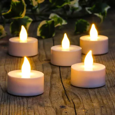 Produktbild von LED Teelichter 10er Set mit Fernbedienung Timer Dimmbar Flackerlicht Weiß