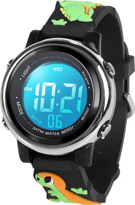 A close-up of a digital watch with a dinosaur design.