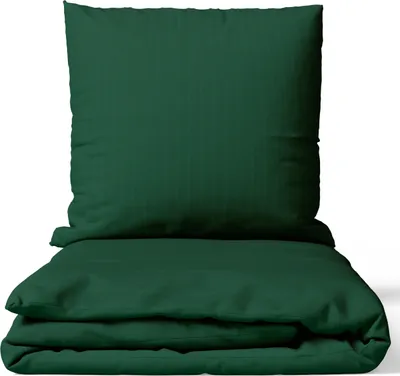 A folded dark green duvet cover and a pillowcase are neatly arranged on a white background.