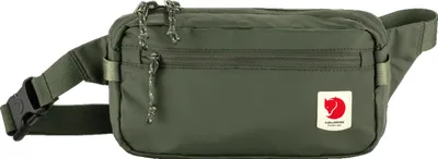 A green Fjällräven hip pack is shown against a white background.