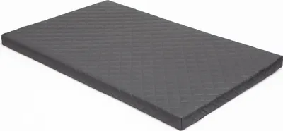 A dark gray quilted dog bed on a white background.