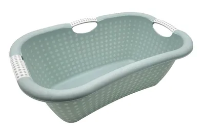 A light green laundry basket with white polka dots and white handles, shown against a white background.