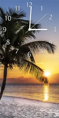 Produktbild von Wallario Design Wanduhr bedruckt, Größe 30 x 60 cm, Motiv: Palme am Strand - Sonnenuntergang über dem Meer