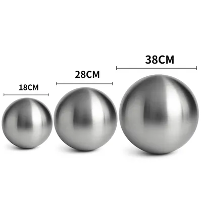 Three stainless steel spheres of different sizes are displayed on a white background, with measurements indicated above each sphere.