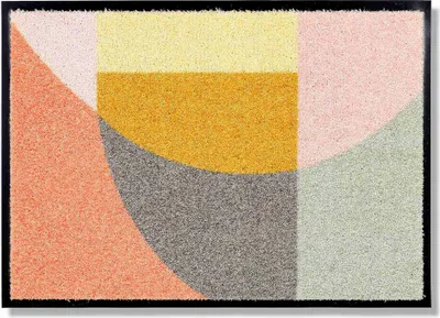 A doormat with a geometric abstract pattern.