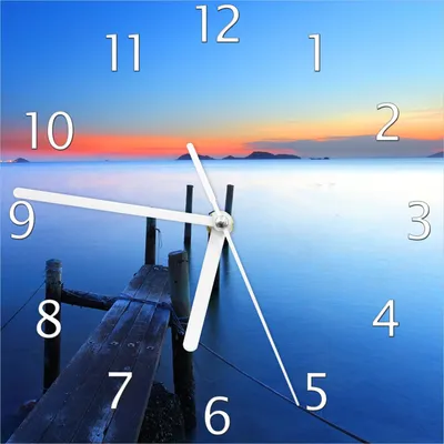 Produktbild von Wallario Design Wanduhr Steg im Wasser - Abendstimmung am Meer aus Echtglas, Größe 20 x 20 cm