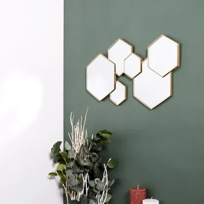 Produktbild von Wanddekoration Spiegel aus goldfarbenem Metall Hexagonale