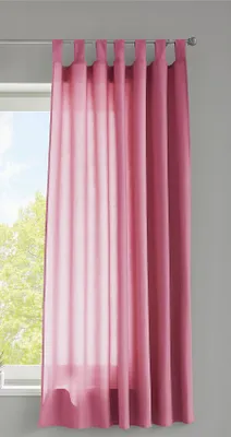 A pink curtain hanging in front of a window.