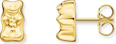 A pair of gold gummy bear earrings on a white background.