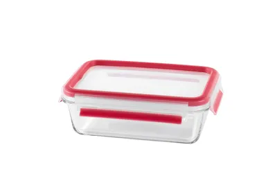 A clear, studio shot of a glass food storage container with a red lid and seal, isolated on a white background.