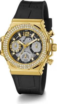 A close-up studio shot of a gold Guess watch with a black band.