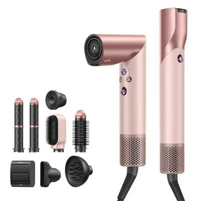 A hair dryer and its attachments are displayed against a white background.