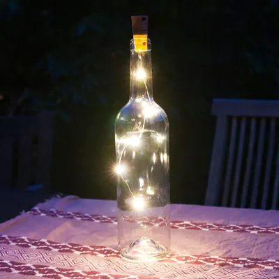 Produktbild von Grafner LED Flaschenkorken | warmweiß | 5 LED | Drahtlichterkette | biegsam | flexibel | incl. Batterien | Glas Korken Licht Kupferdraht Lichterkette für Flasche DIY (1 Stück)