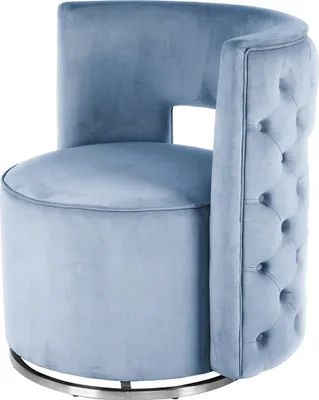 A light blue velvet armchair with a silver base.