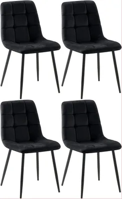 Four black velvet dining chairs arranged in a 2x2 grid.