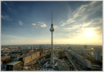 Produktbild von Wallario Wandbild Fernsehturm Berlin mit Panoramablick über die Stadt, Größe: 70,30 x 100,30 cm, Poster mit weißem Kunststoffrahmen