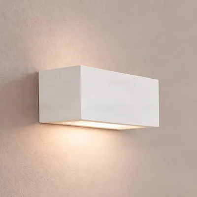Produktbild von Lindby Wandlampe Tjada, 22 cm, weiß, Gips, G9, bemalbar, KI-generiertes Bild