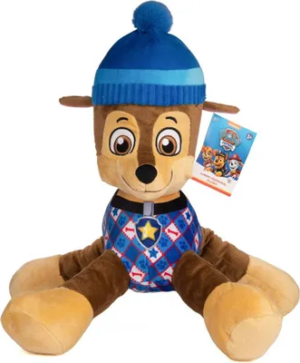 A plush toy of the character Chase from Paw Patrol, wearing a winter hat and sweater.
