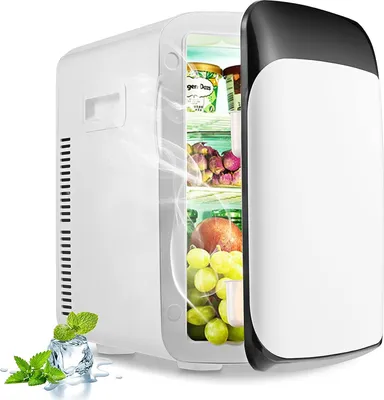 A white mini-refrigerator with its door open, showing food items inside. Steam or mist is emanating from the open door, and mint leaves and ice cubes are placed in front of the refrigerator.
